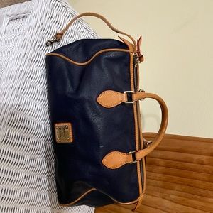Black bags with tan accents